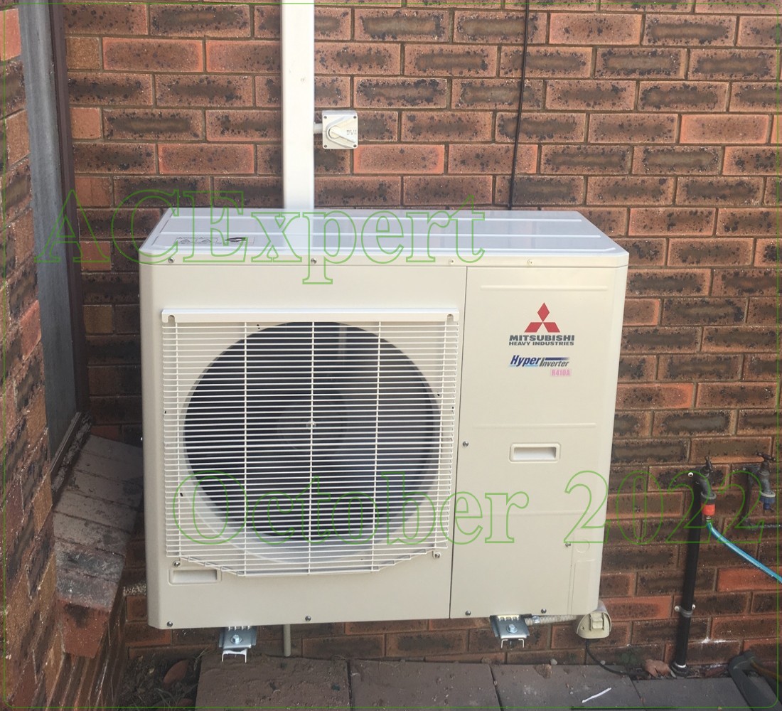 Before and after of a living room with old heaters replaced by sleek ducted system