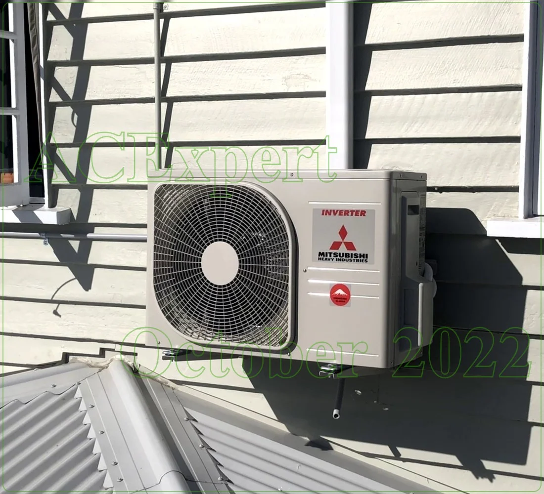 Outdoor split system unit mounted on a residential wall in Brisbane showing proper installation placement