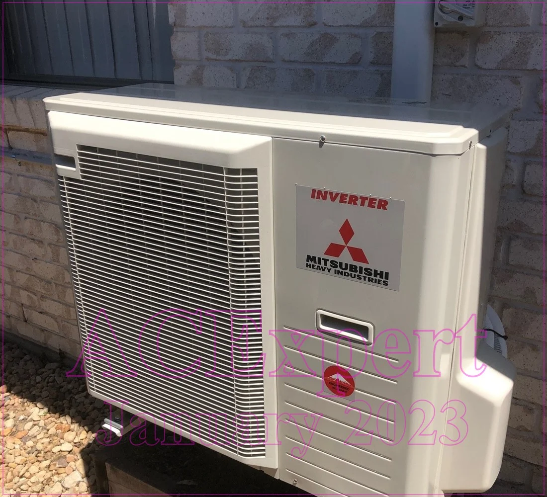 Professional split system installation showing where to mount the outdoor unit on an exterior wall in Brisbane.