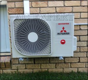 Professional team installing a split system air conditioner in a Brisbane home
